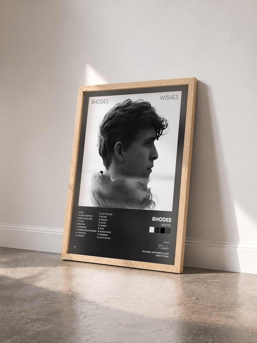 #bois Tableau de l'album Wishes de Rhodes vu de trois quarts, cadre en bois brut