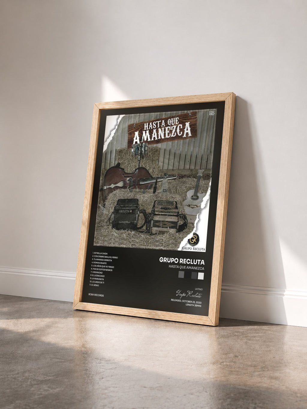 #bois Tableau de l'album Hasta Que Amanezca de Grupo Recluta vu de trois quarts, cadre en bois brut