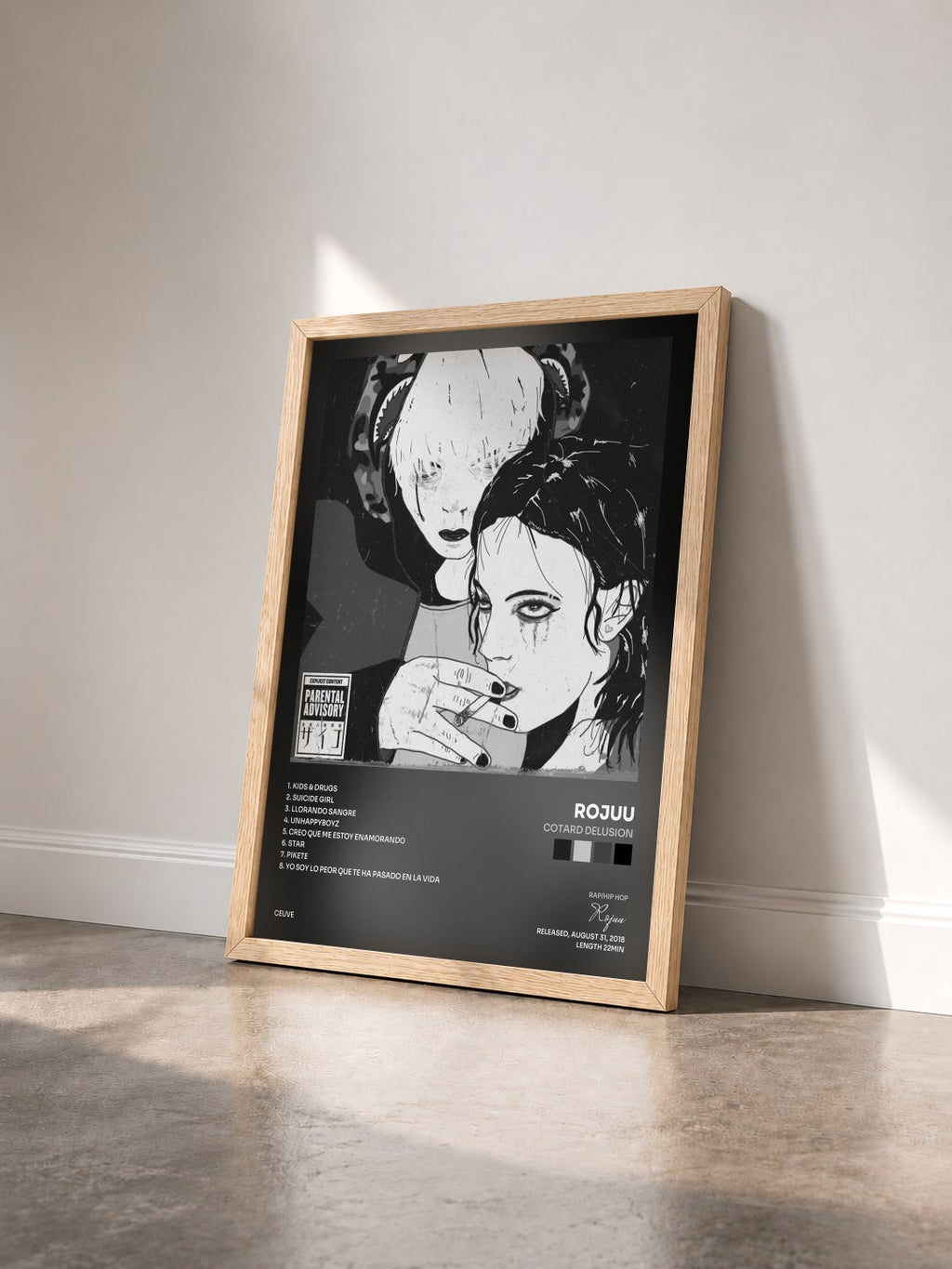 #bois Tableau de l'album Cotard Delusion de Rojuu vu de trois quarts, cadre en bois brut