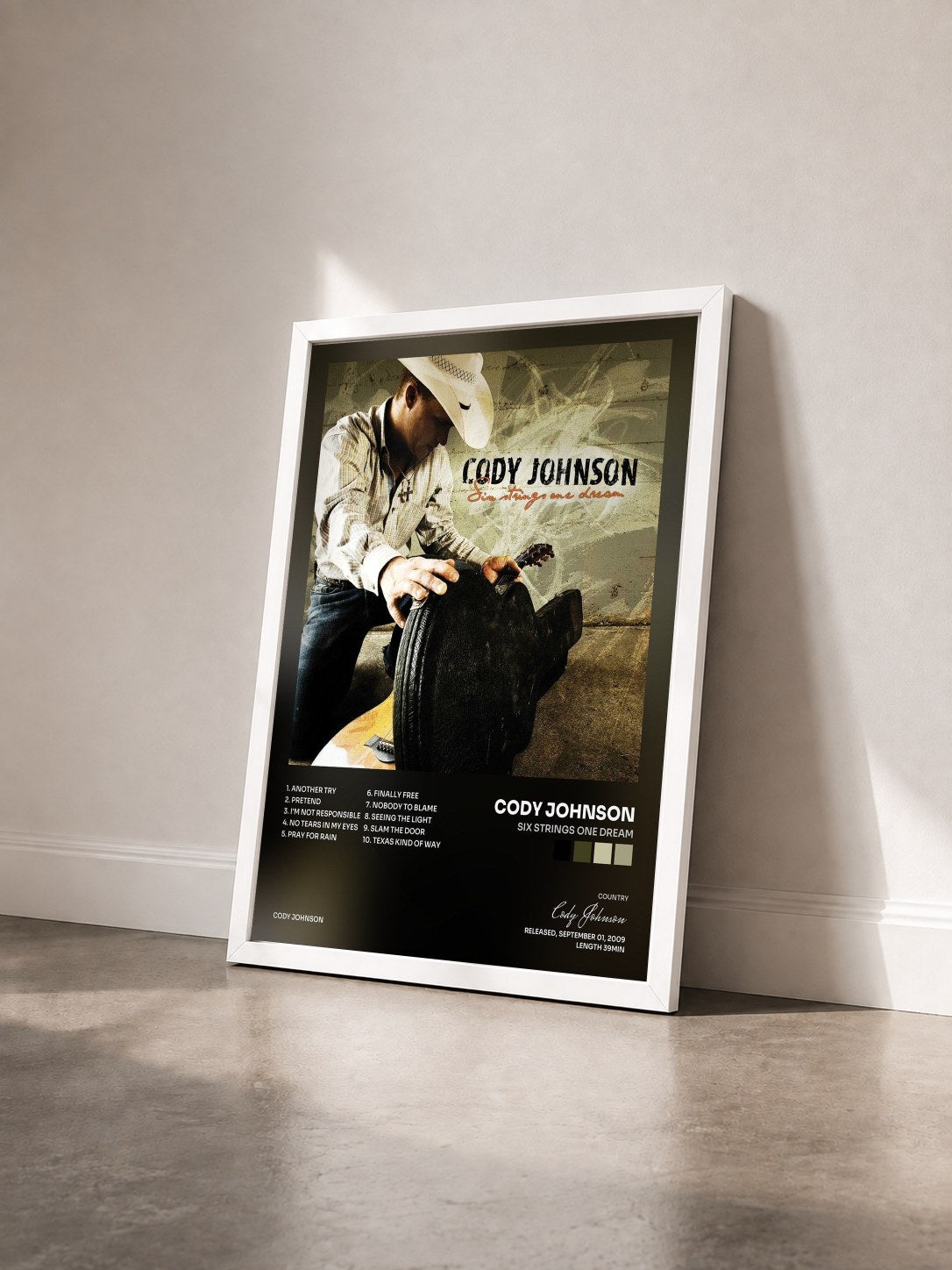 #blanc Tableau de l'album Six Strings One Dream de Cody Johnson vu de trois quarts, cadre blanc