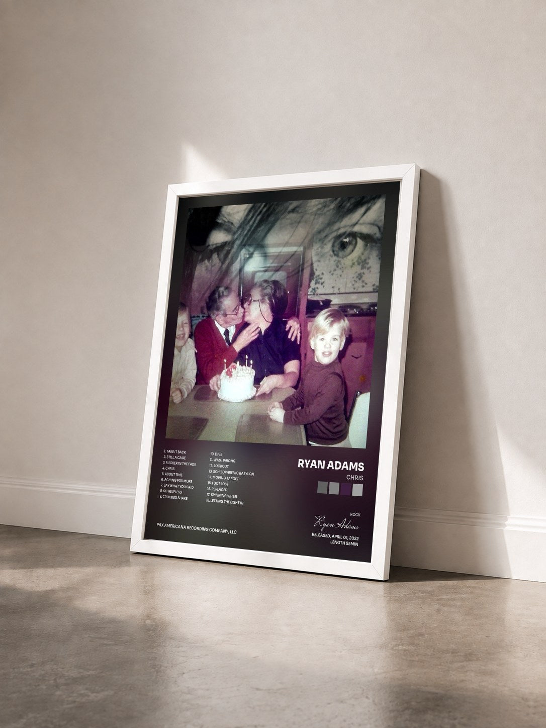 #blanc Tableau de l'album Chris de Ryan Adams vu de trois quarts, cadre blanc