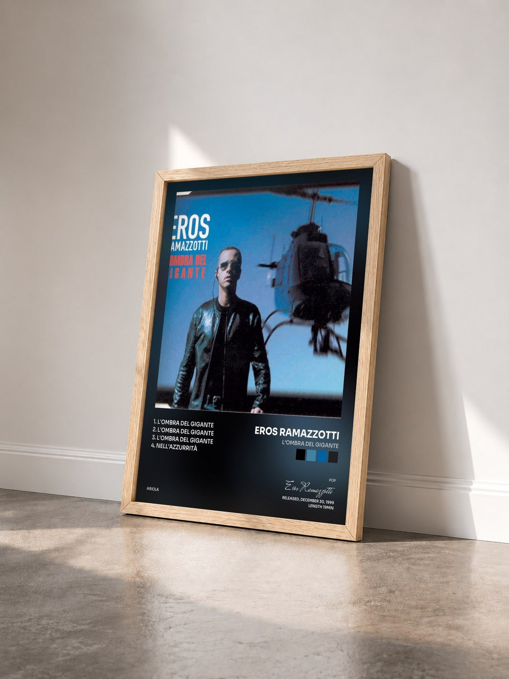 #bois Tableau de l'album L'Ombra Del Gigante de Eros Ramazzotti vu de trois quarts, cadre en bois brut