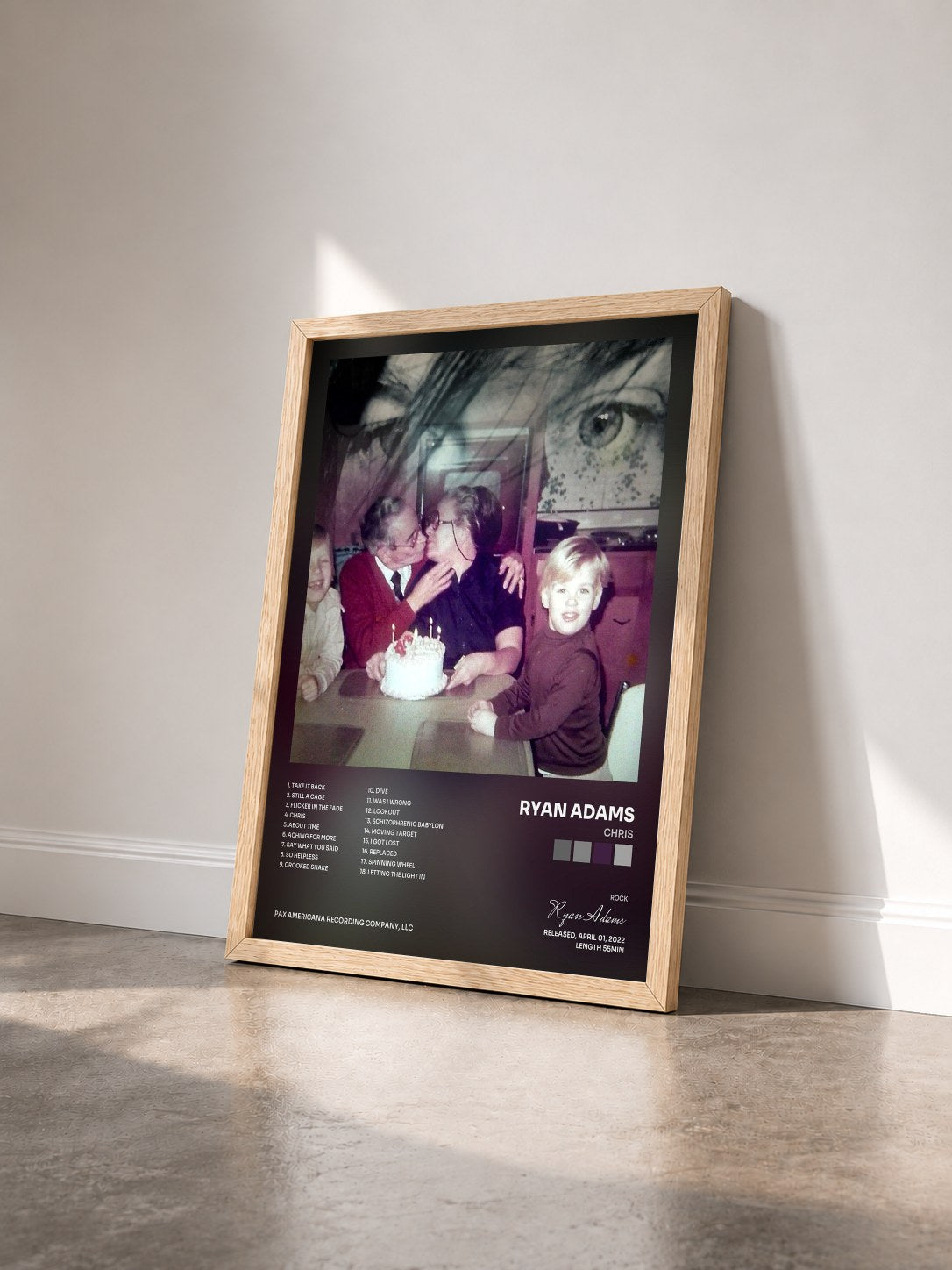 #bois Tableau de l'album Chris de Ryan Adams vu de trois quarts, cadre en bois brut