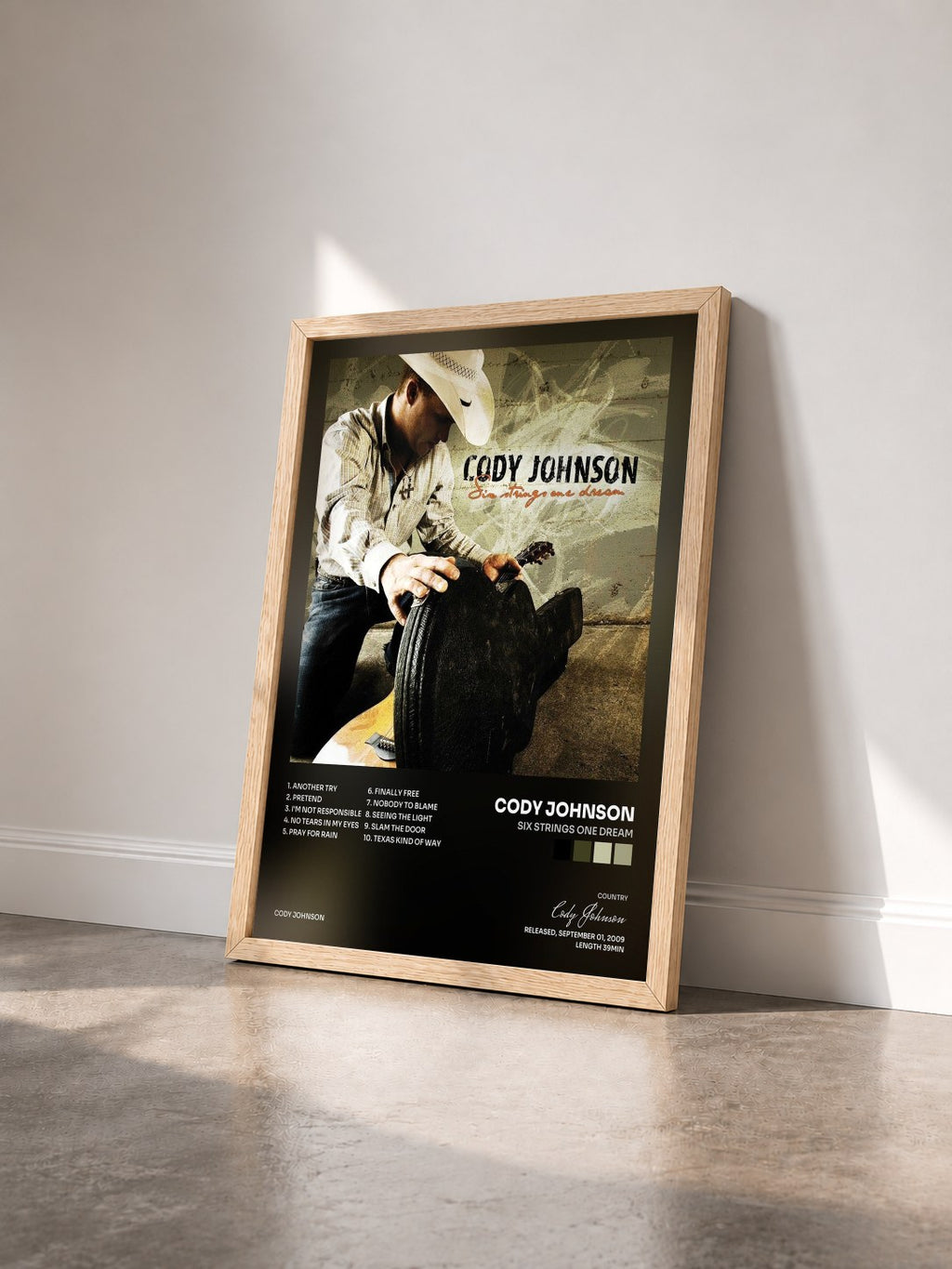 #bois Tableau de l'album Six Strings One Dream de Cody Johnson vu de trois quarts, cadre en bois brut