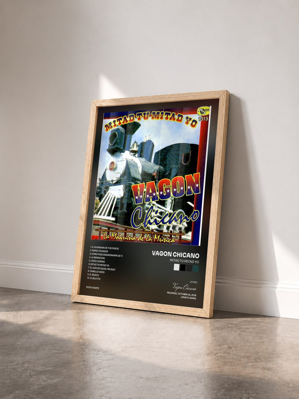 #bois Tableau de l'album Mitad Tu Mitad Yo de Vagon Chicano vu de trois quarts, cadre en bois brut