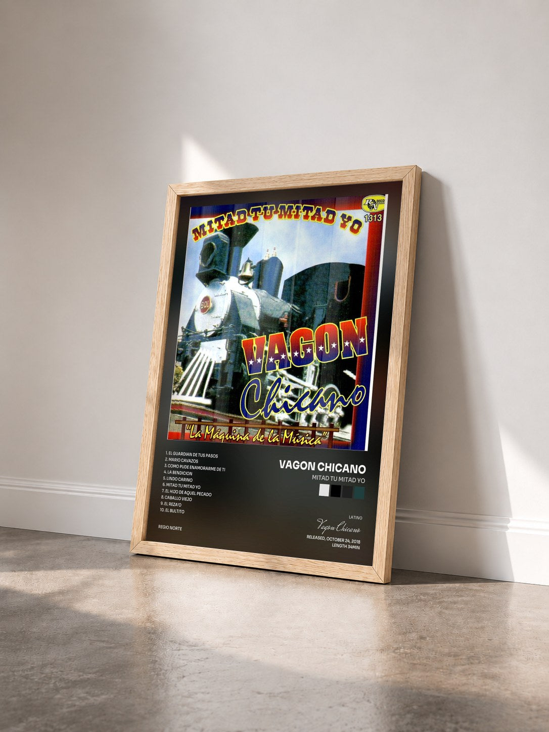 #bois Tableau de l'album Mitad Tu Mitad Yo de Vagon Chicano vu de trois quarts, cadre en bois brut