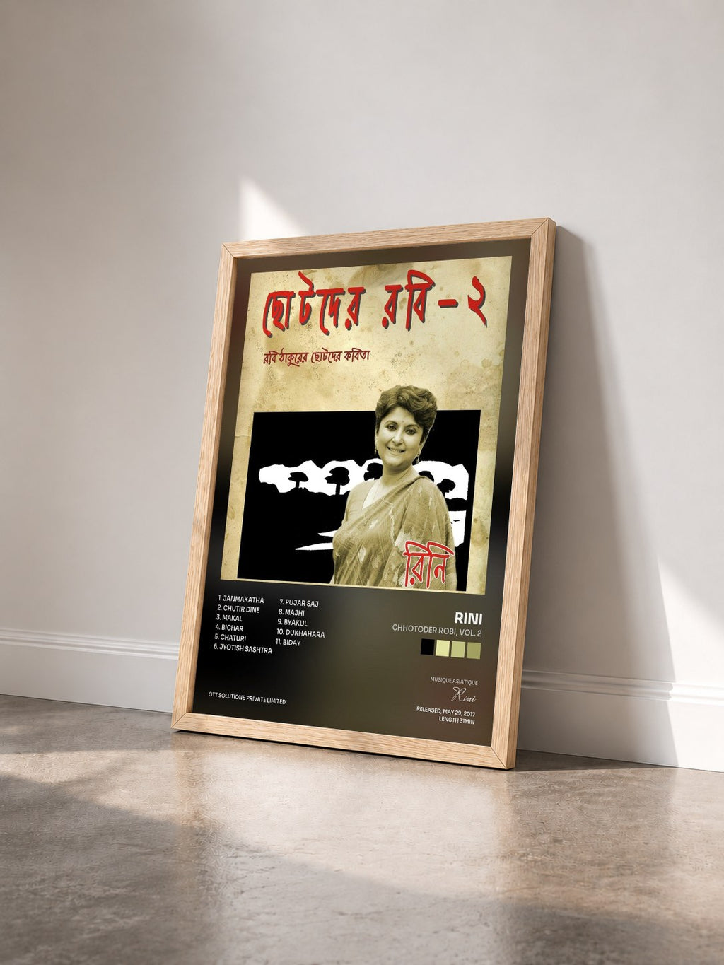 #bois Tableau de l'album Chhotoder Robi, Vol. 2 de Rini vu de trois quarts, cadre en bois brut