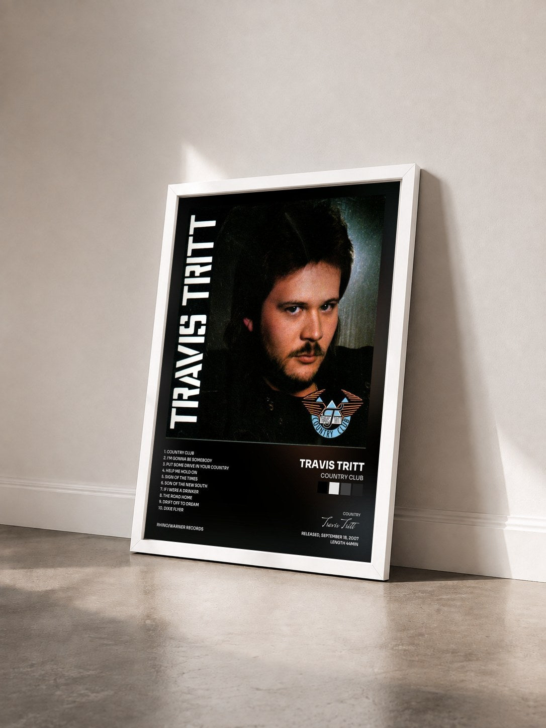 #blanc Tableau de l'album Country Club de Travis Tritt vu de trois quarts, cadre blanc