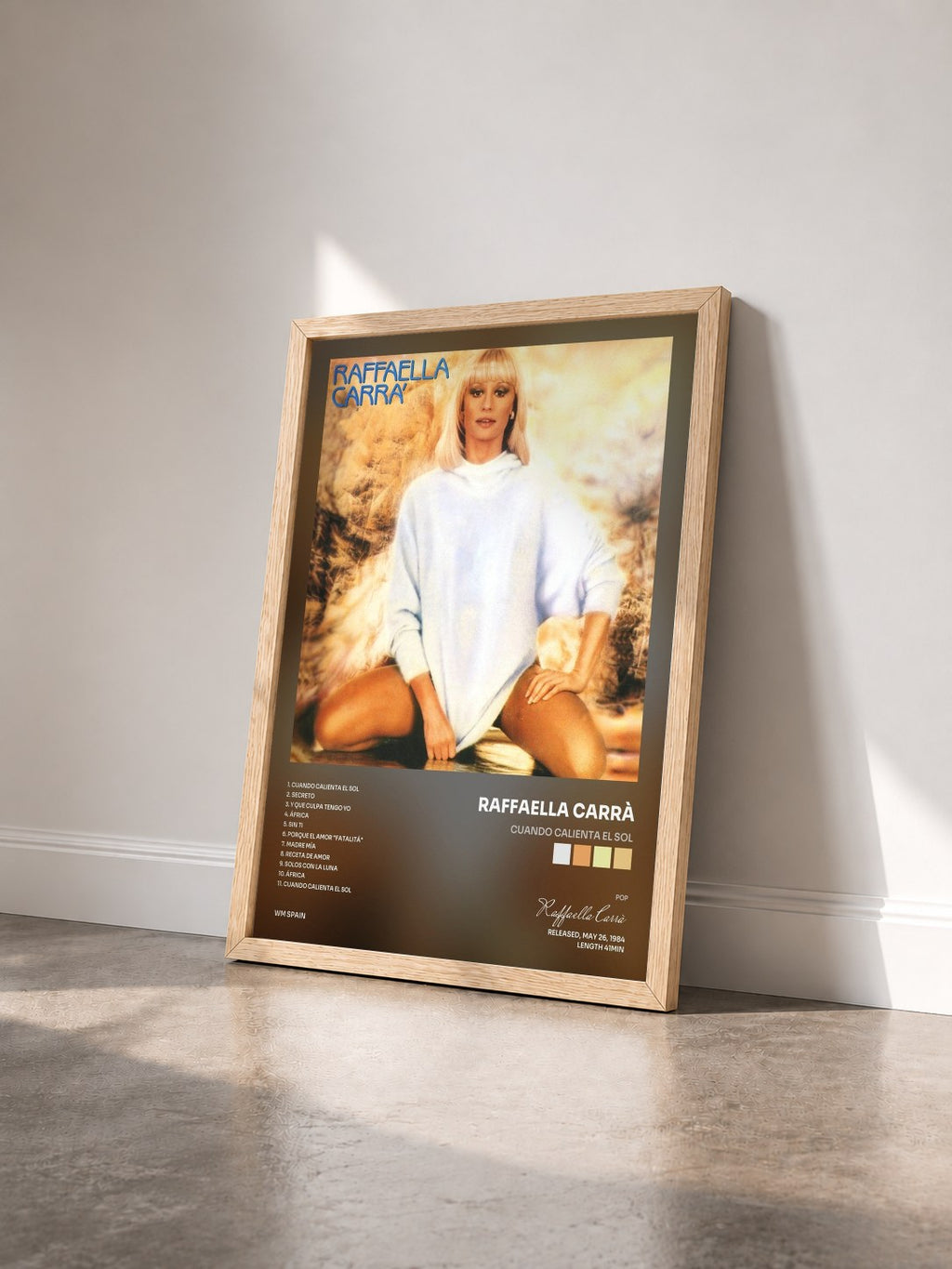 #bois Tableau de l'album Cuando calienta el sol de Raffaella Carrà vu de trois quarts, cadre en bois brut