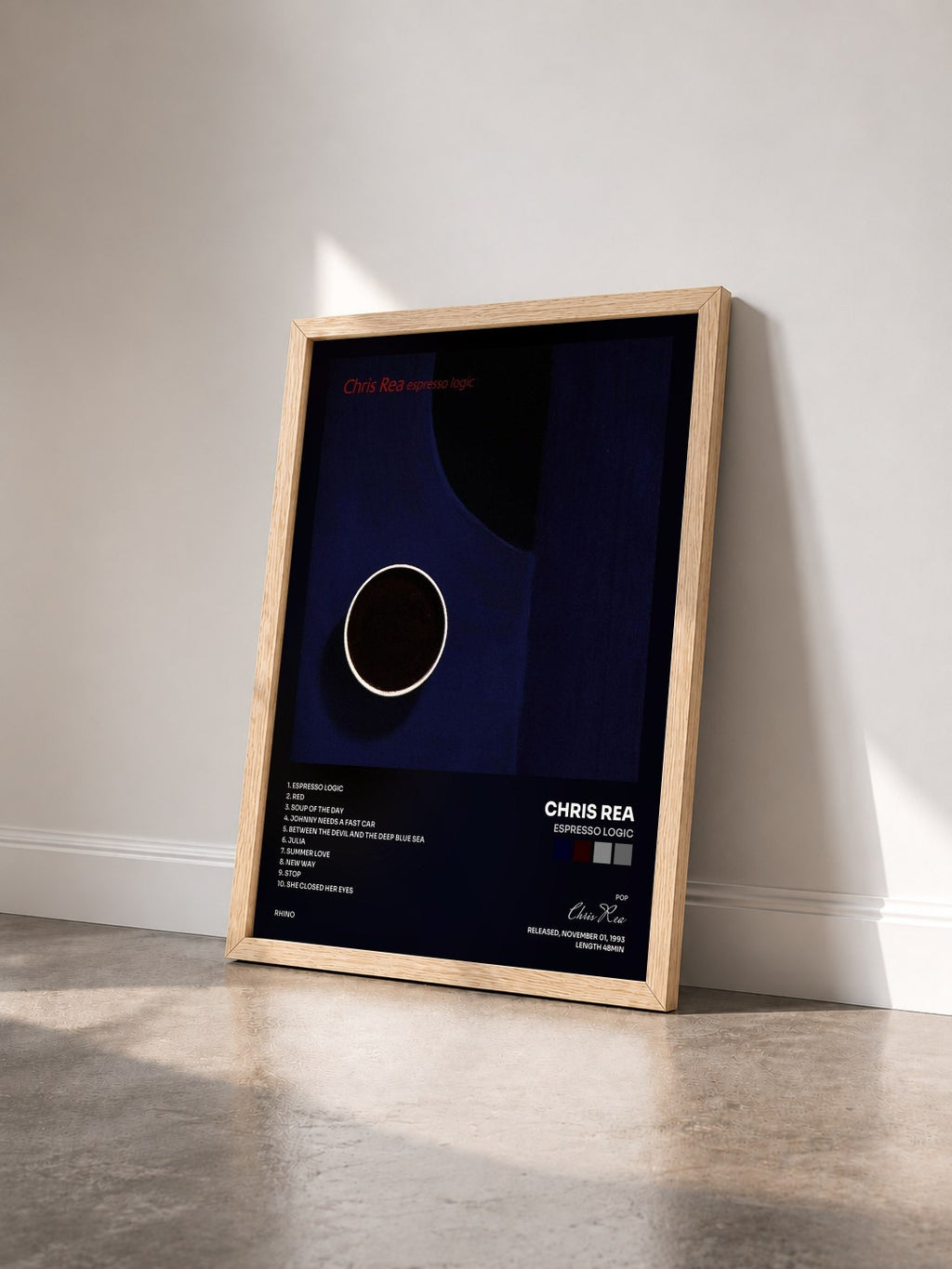 #bois Tableau de l'album Espresso Logic de Chris Rea vu de trois quarts, cadre en bois brut