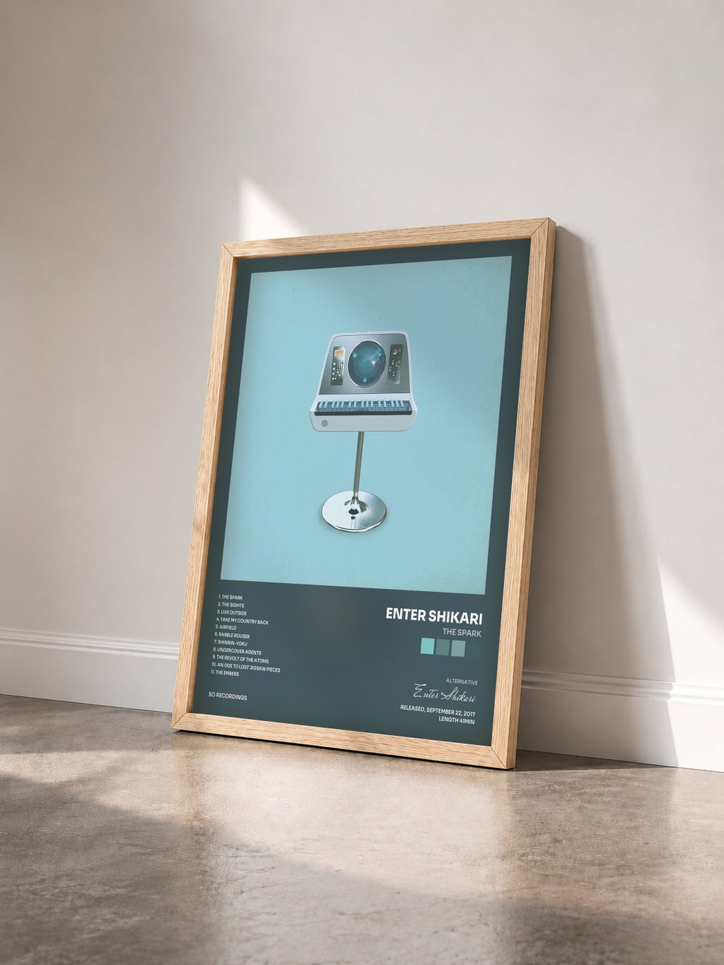 #bois Tableau de l'album The Spark de Enter Shikari vu de trois quarts, cadre en bois brut