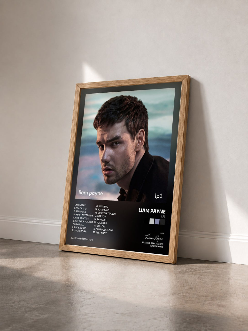 #bois Tableau de l'album LP1 de Liam Payne vu de trois quarts, cadre en bois brut