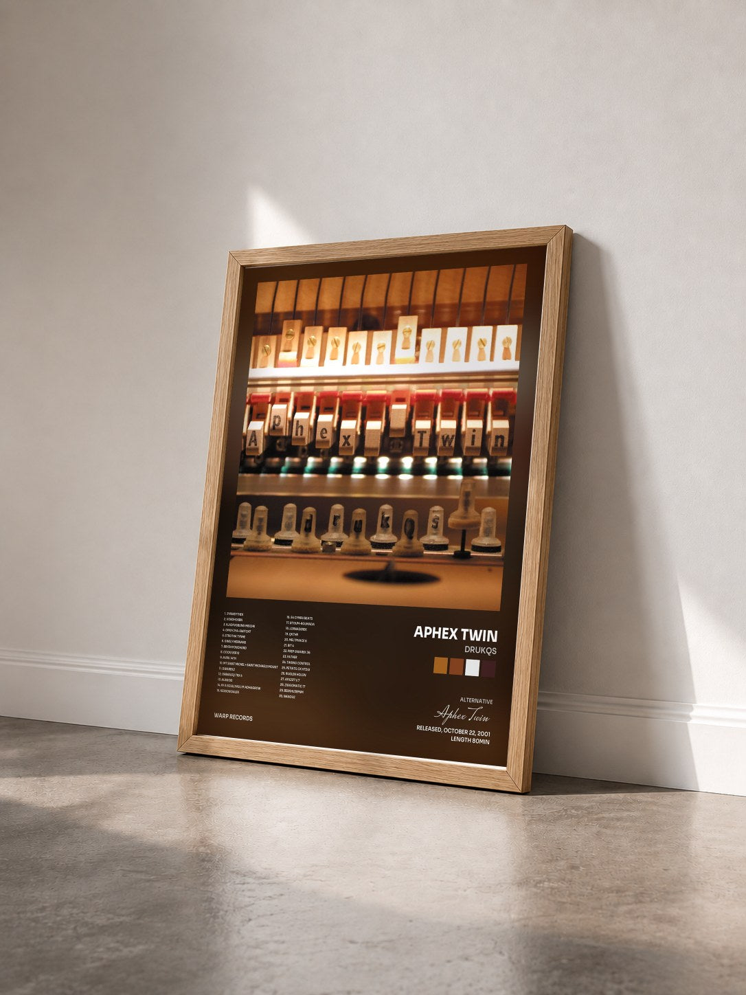 #bois Tableau de l'album Drukqs de Aphex Twin vu de trois quarts, cadre en bois brut