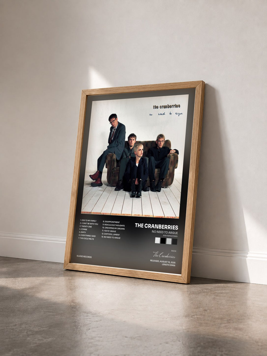 #bois Tableau de l'album No Need To Argue (2025 Remastered) de The Cranberries vu de trois quarts, cadre en bois brut