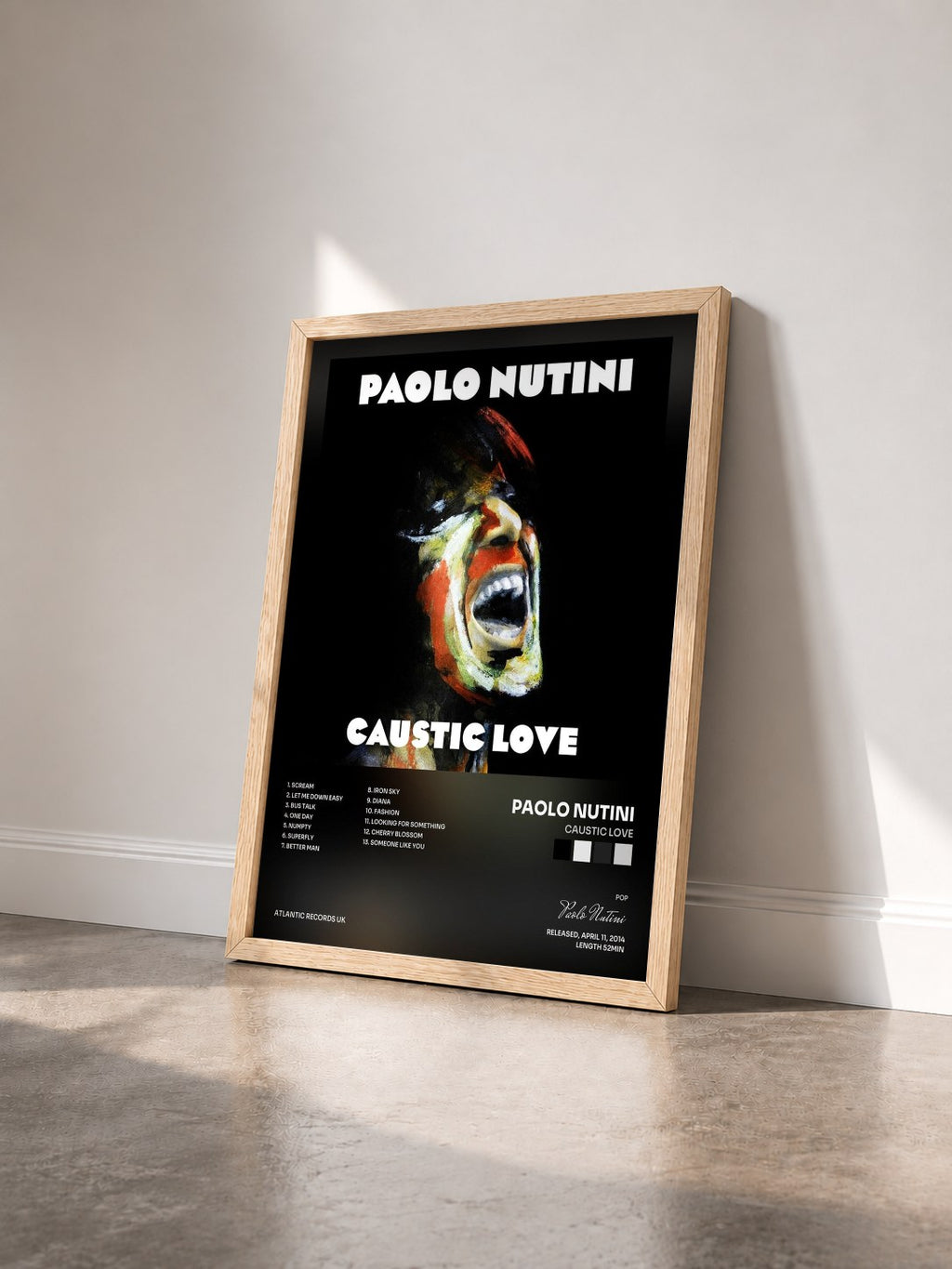 #bois Tableau de l'album Caustic Love de Paolo Nutini vu de trois quarts, cadre en bois brut
