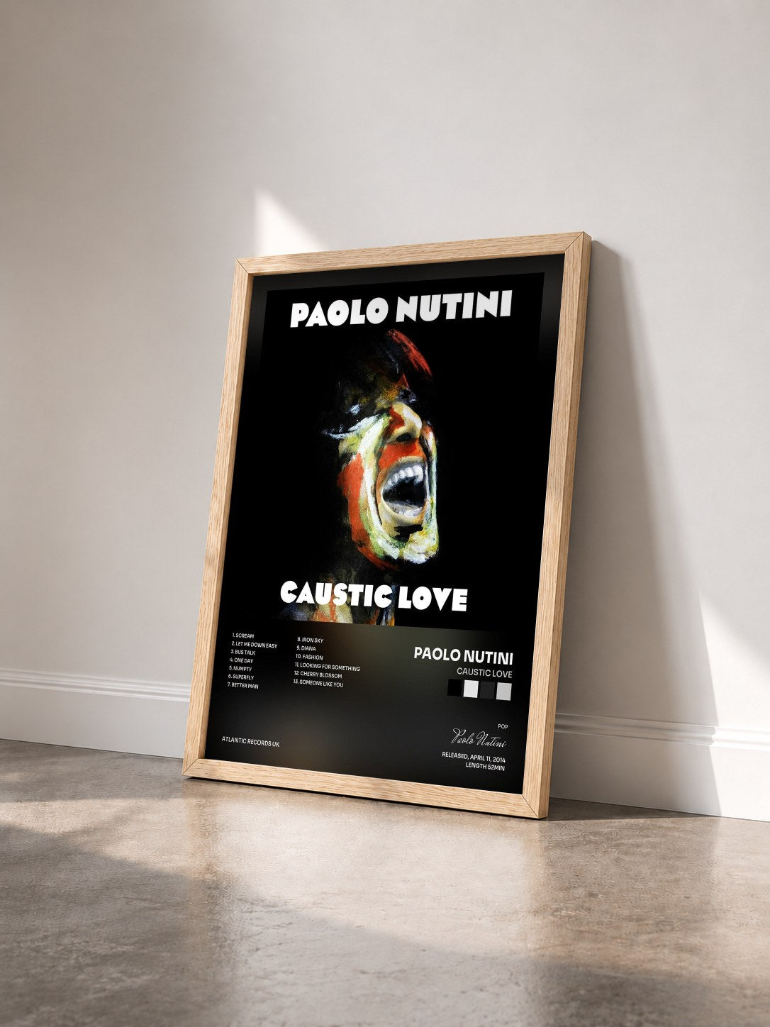 #bois Tableau de l'album Caustic Love de Paolo Nutini vu de trois quarts, cadre en bois brut