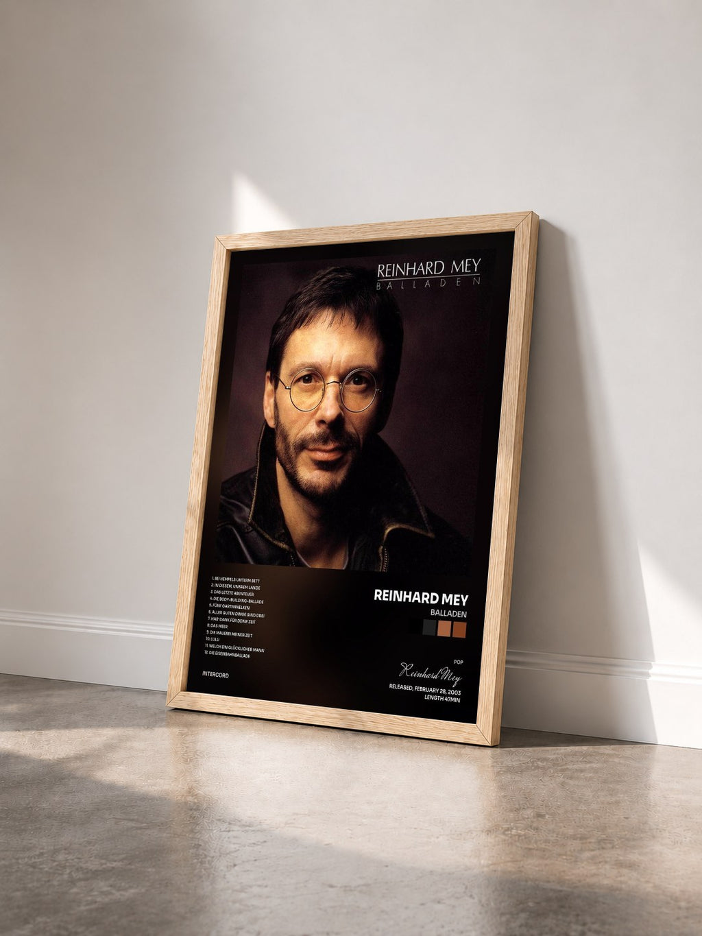 #bois Tableau de l'album Balladen de Reinhard Mey vu de trois quarts, cadre en bois brut