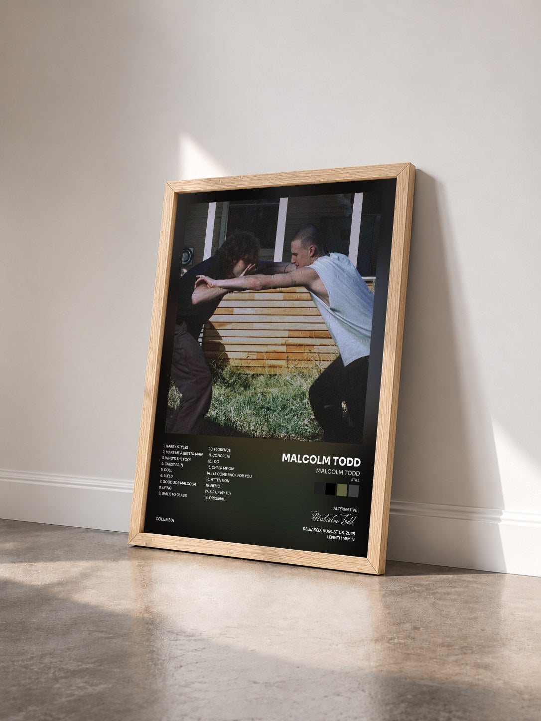 #bois Tableau de l'album Malcolm Todd (still) de Malcolm Todd vu de trois quarts, cadre en bois brut