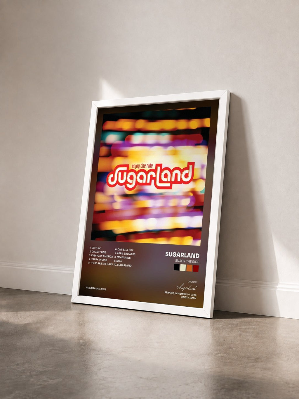 #blanc Tableau de l'album Enjoy The Ride de Sugarland vu de trois quarts, cadre blanc