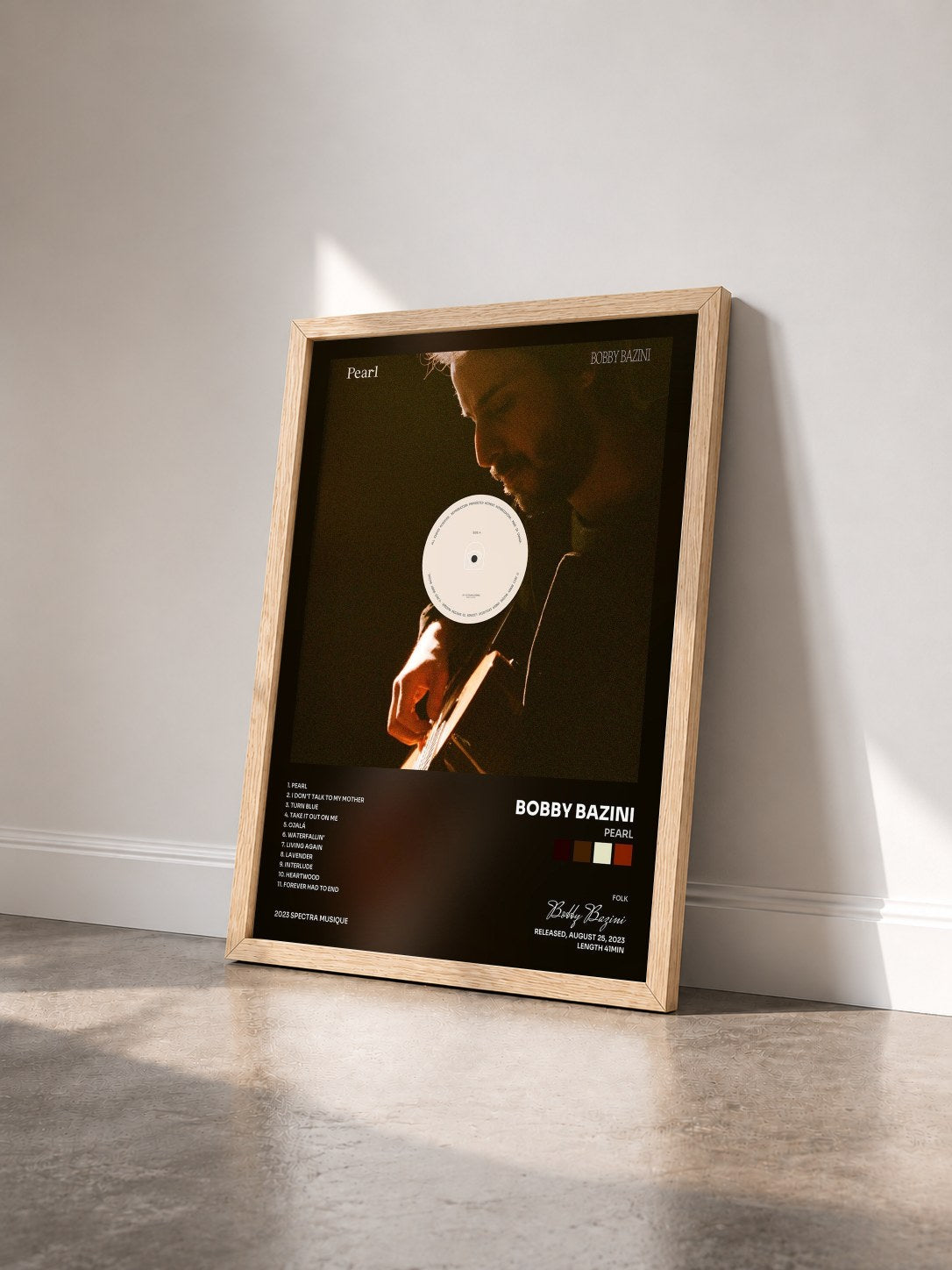 #bois Tableau de l'album Pearl de Bobby Bazini vu de trois quarts, cadre en bois brut