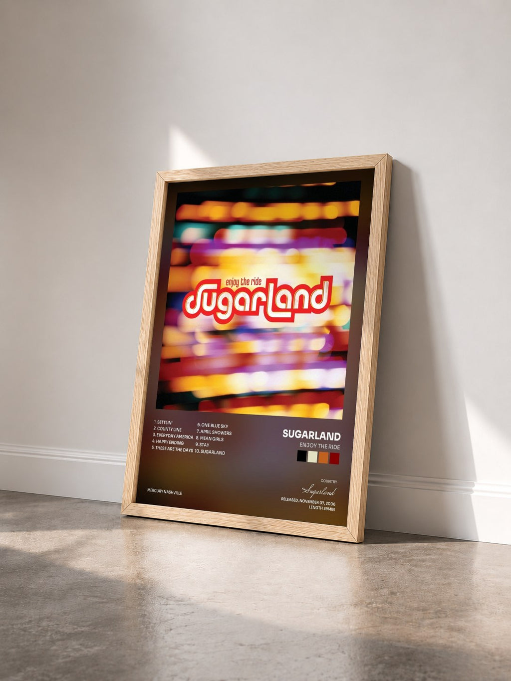 #bois Tableau de l'album Enjoy The Ride de Sugarland vu de trois quarts, cadre en bois brut
