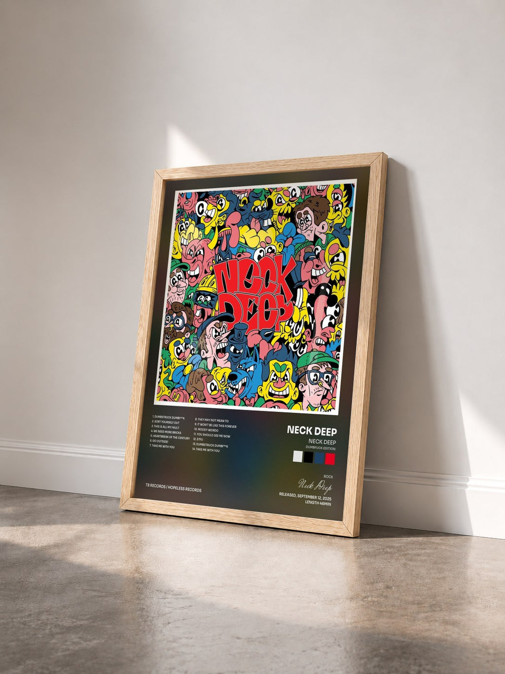 #bois Tableau de l'album Neck Deep (Dumbfuck Edition) de Neck Deep vu de trois quarts, cadre en bois brut
