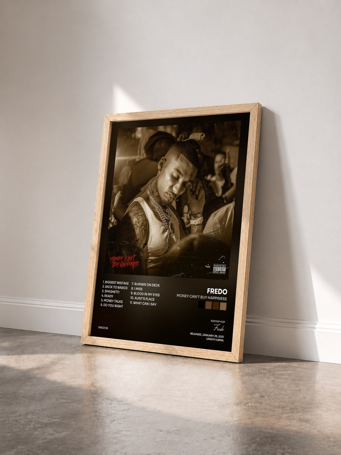 #bois Tableau de l'album Money Can't Buy Happiness de Fredo vu de trois quarts, cadre en bois brut