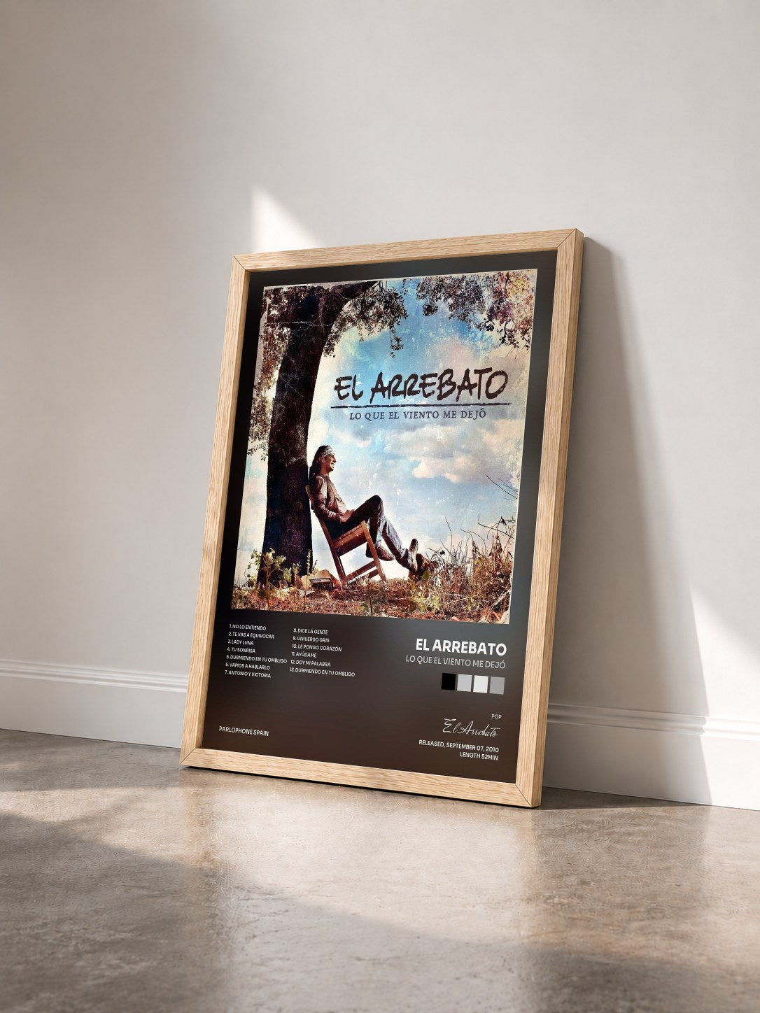 #bois Tableau de l'album Lo Que El viento Me Dejó de El Arrebato vu de trois quarts, cadre en bois brut