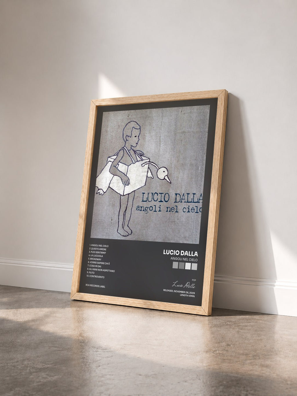 #bois Tableau de l'album Angoli Nel Cielo de Lucio Dalla vu de trois quarts, cadre en bois brut