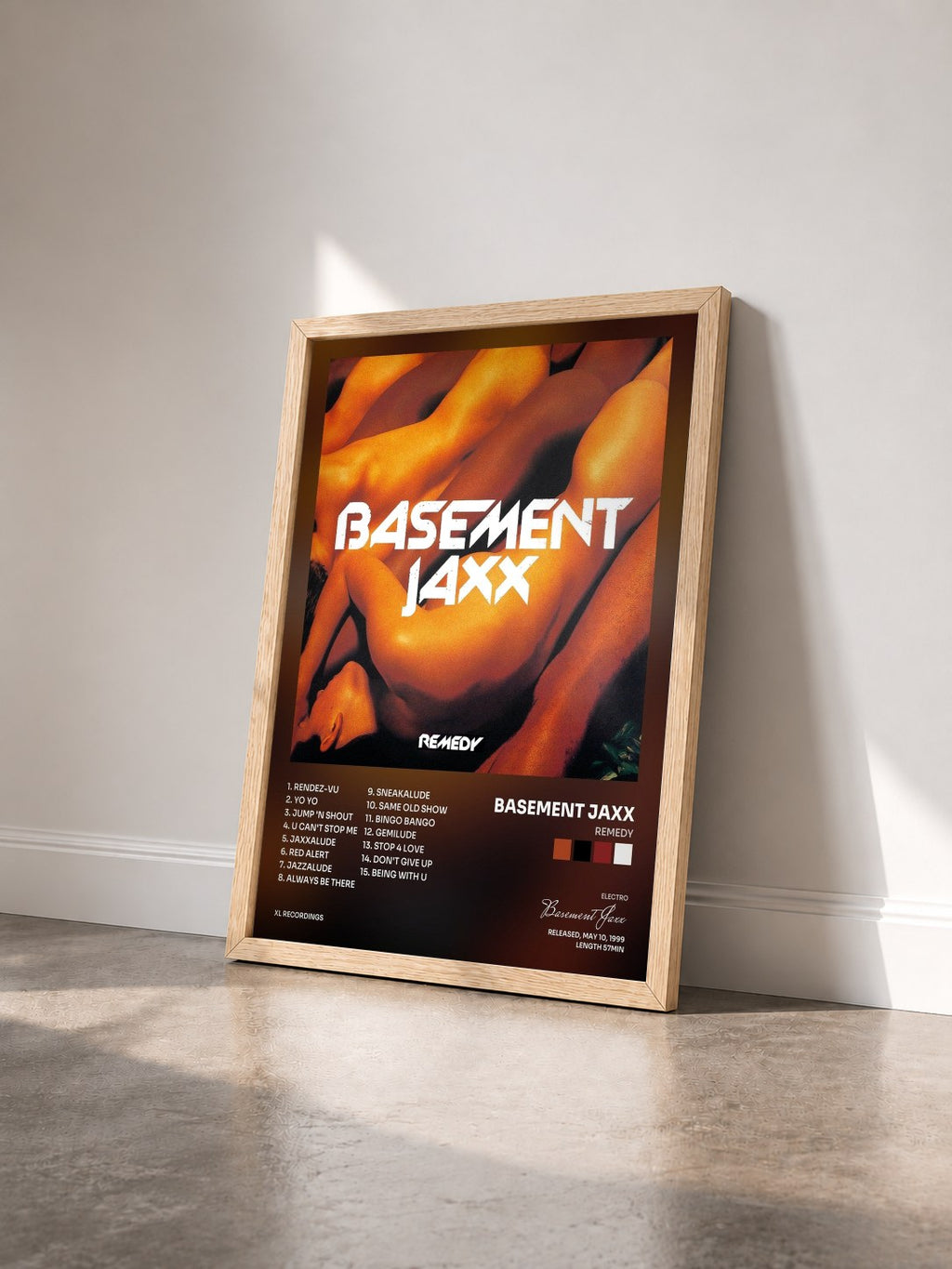 #bois Tableau de l'album Remedy de Basement Jaxx vu de trois quarts, cadre en bois brut