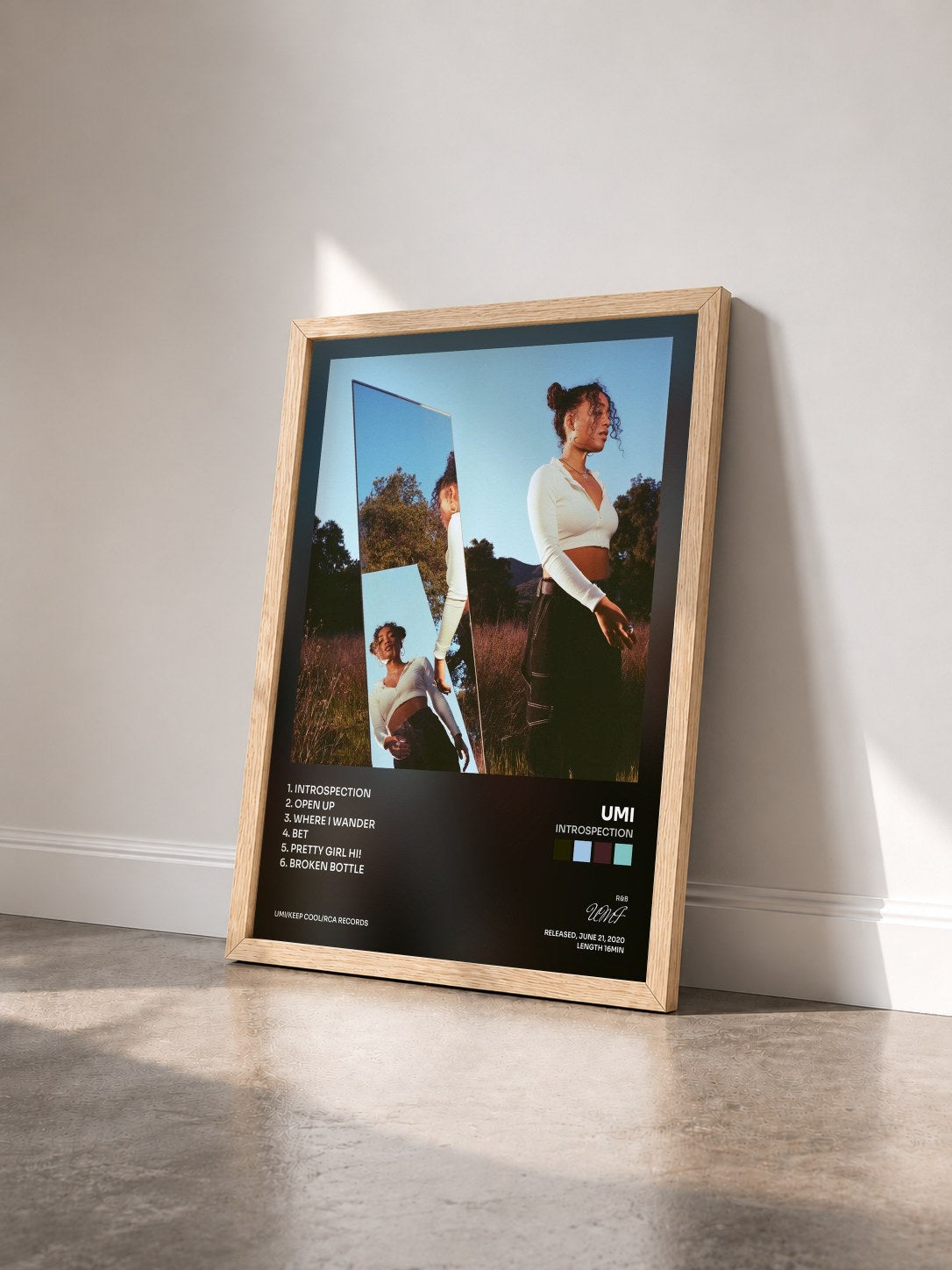 #bois Tableau de l'album Introspection de UMI vu de trois quarts, cadre en bois brut
