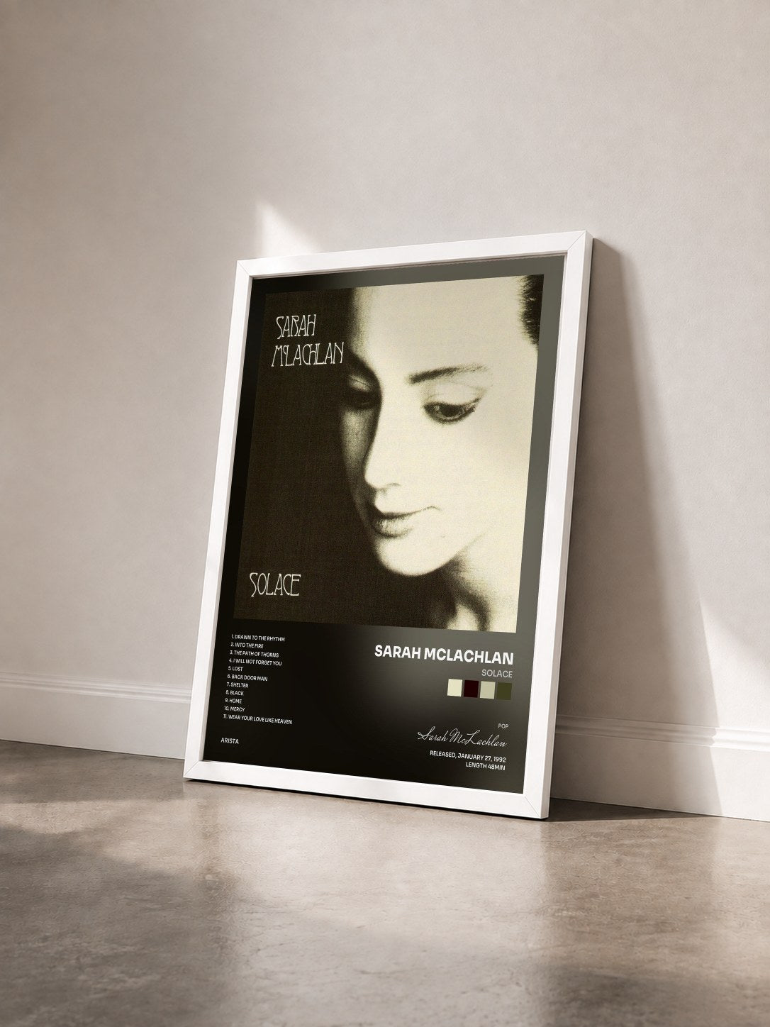 #blanc Tableau de l'album Solace de Sarah McLachlan vu de trois quarts, cadre blanc