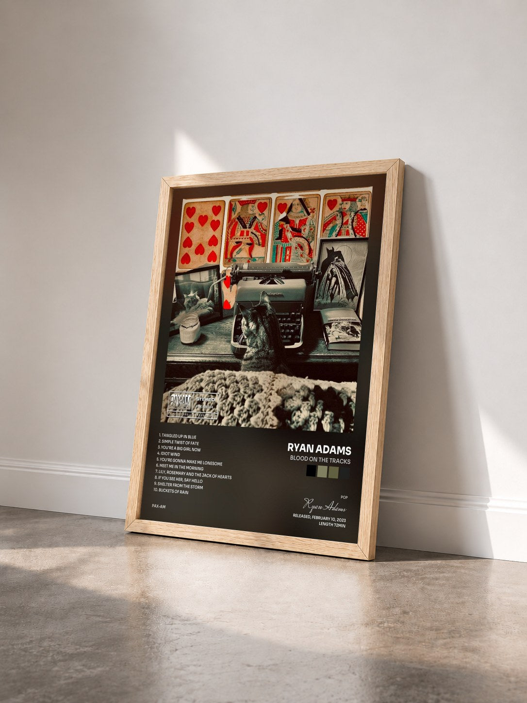 #bois Tableau de l'album Blood on the Tracks de Ryan Adams vu de trois quarts, cadre en bois brut