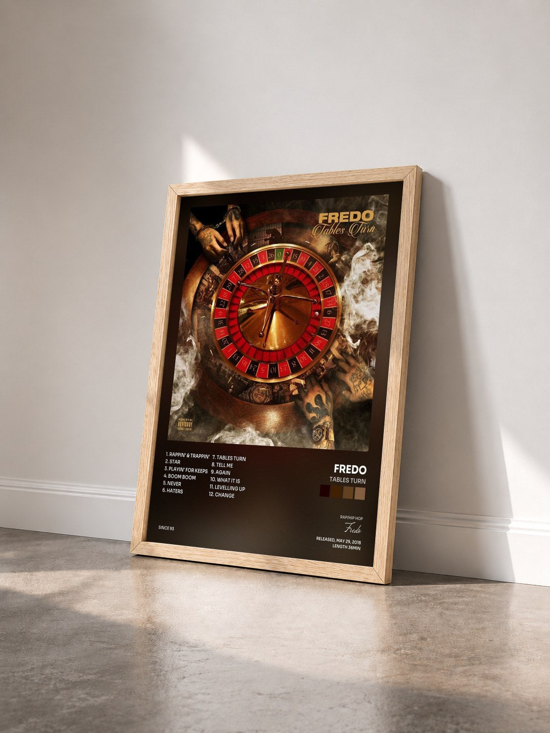#bois Tableau de l'album Tables Turn de Fredo vu de trois quarts, cadre en bois brut