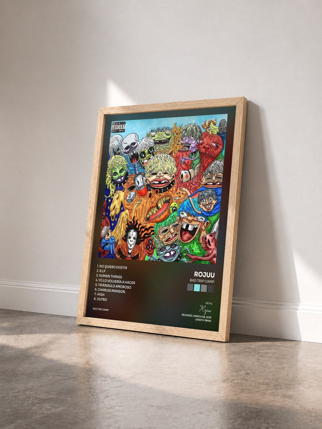 #bois Tableau de l'album Bad Trip Camp de Rojuu vu de trois quarts, cadre en bois brut