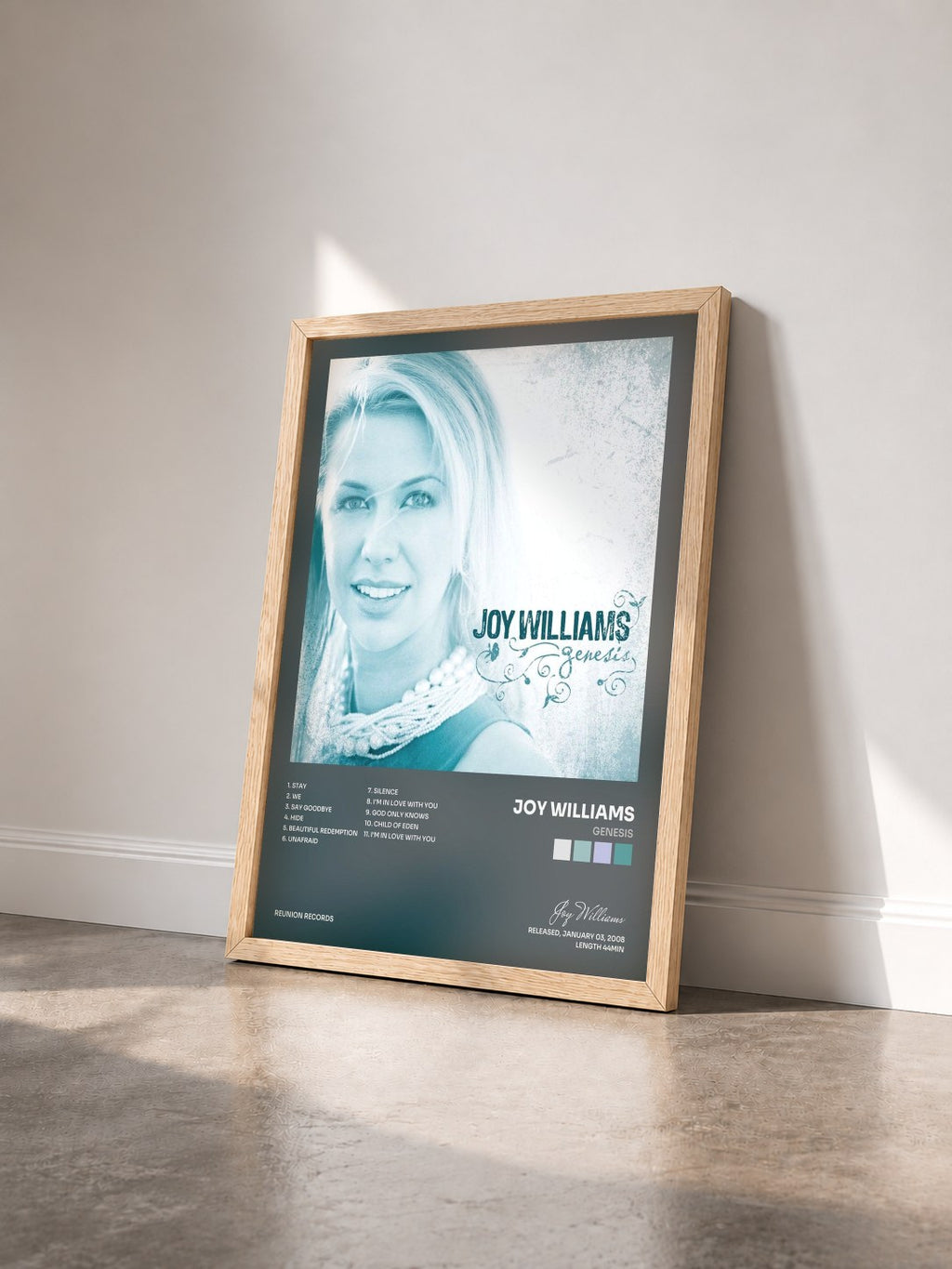 #bois Tableau de l'album Genesis de Joy Williams vu de trois quarts, cadre en bois brut
