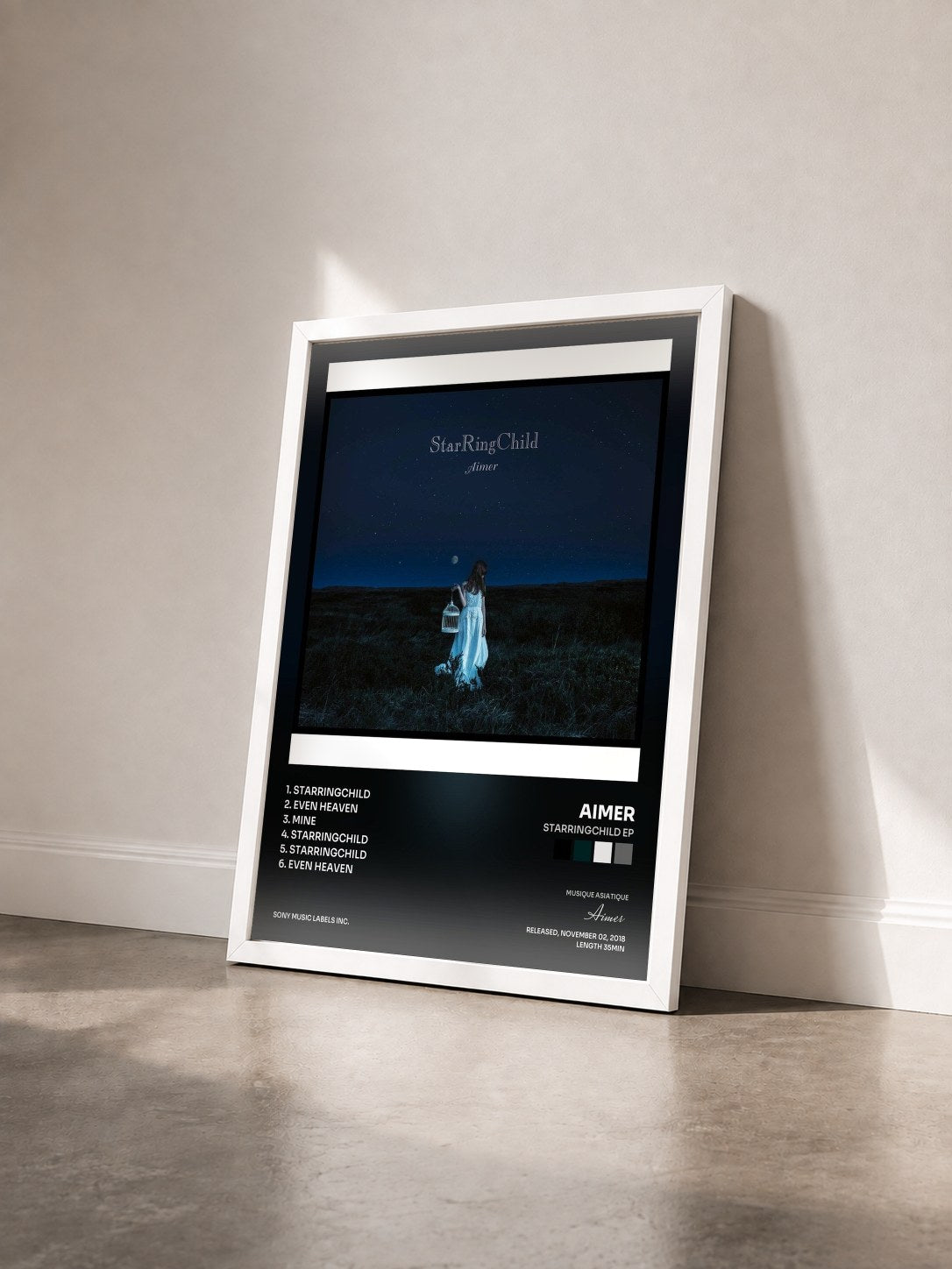 #blanc Tableau de l'album StarRingChild EP de Aimer vu de trois quarts, cadre blanc