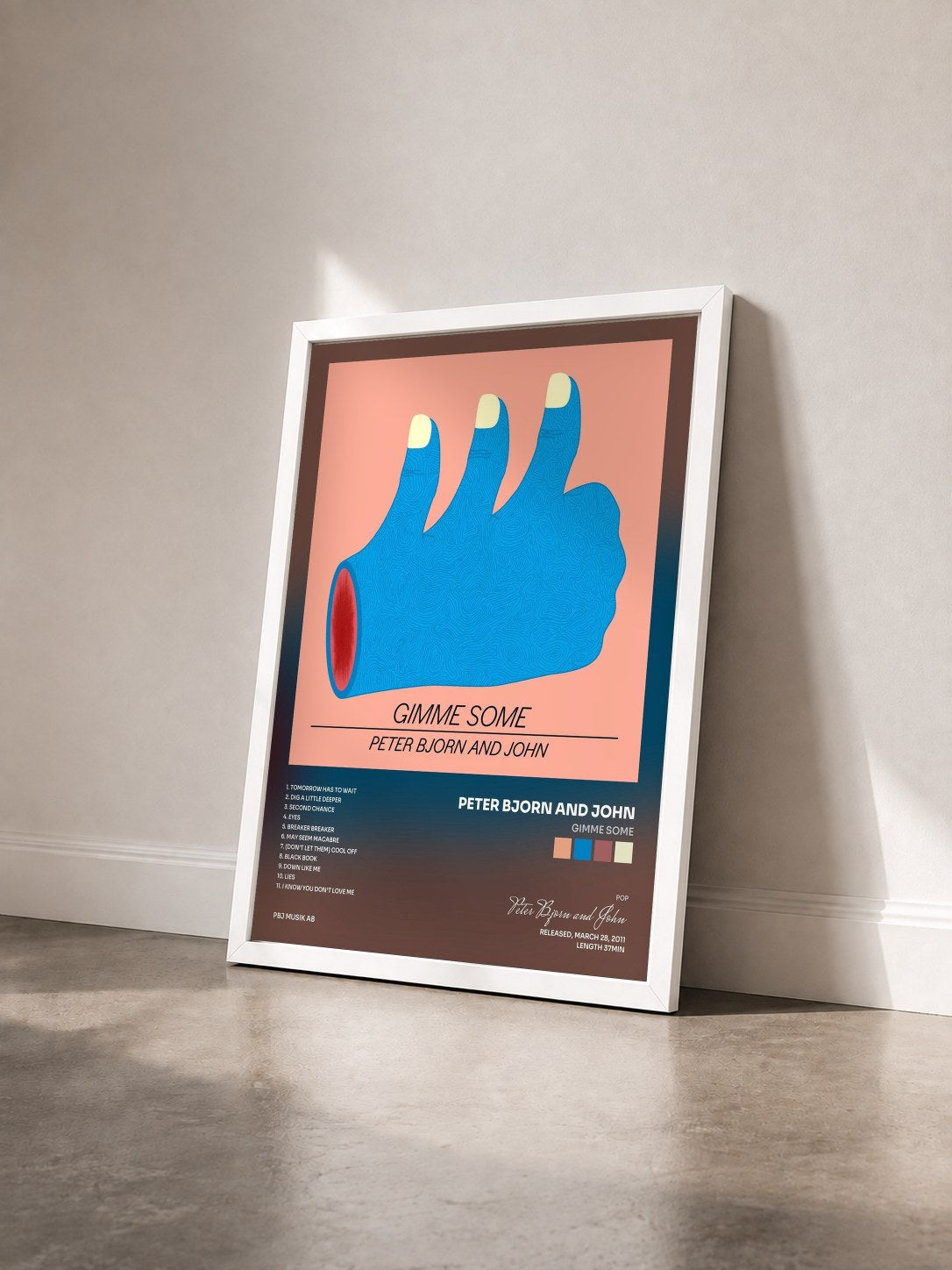 #blanc Tableau de l'album Gimme Some de Peter Bjorn and John vu de trois quarts, cadre blanc