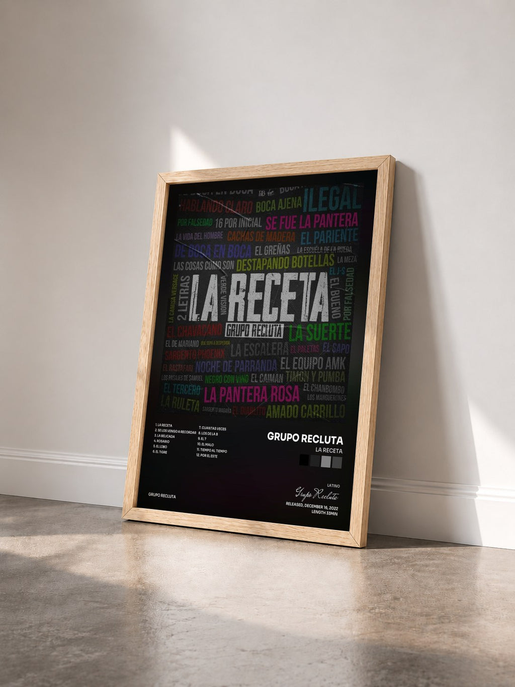 #bois Tableau de l'album La Receta de Grupo Recluta vu de trois quarts, cadre en bois brut