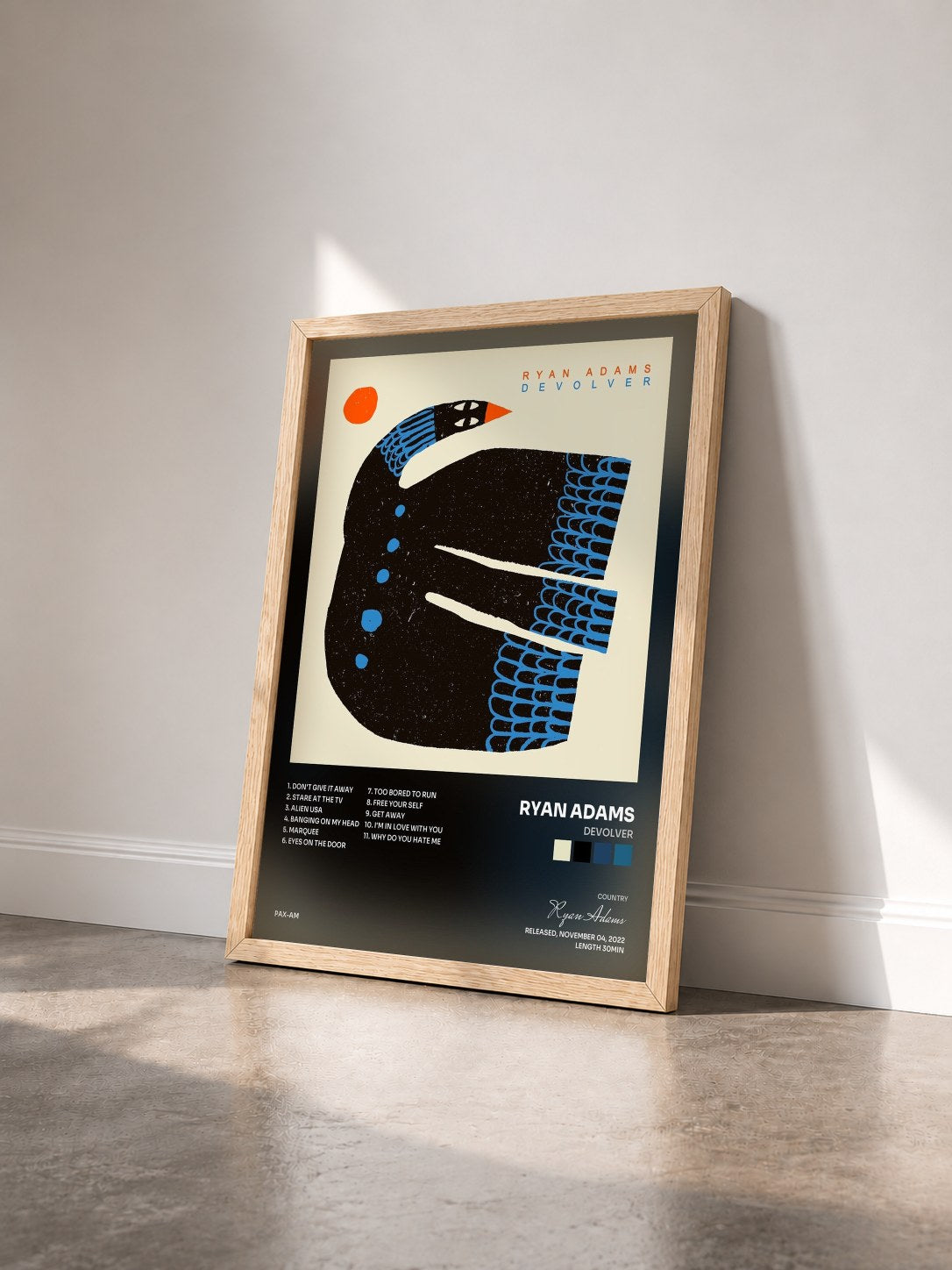 #bois Tableau de l'album Devolver de Ryan Adams vu de trois quarts, cadre en bois brut