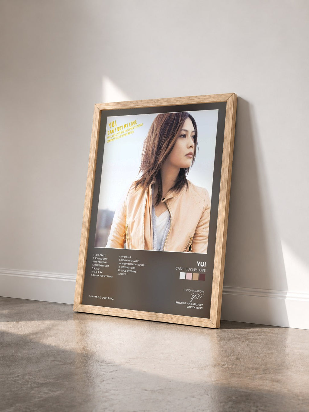 #bois Tableau de l'album CAN'T BUY MY LOVE de YUI vu de trois quarts, cadre en bois brut