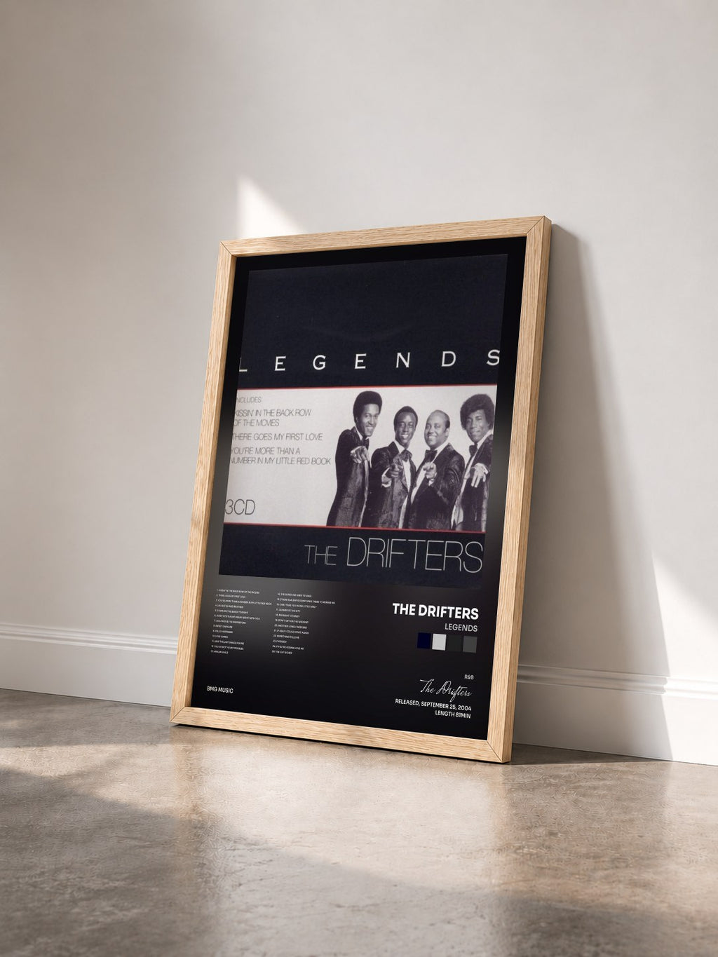 #bois Tableau de l'album Legends de The Drifters vu de trois quarts, cadre en bois brut
