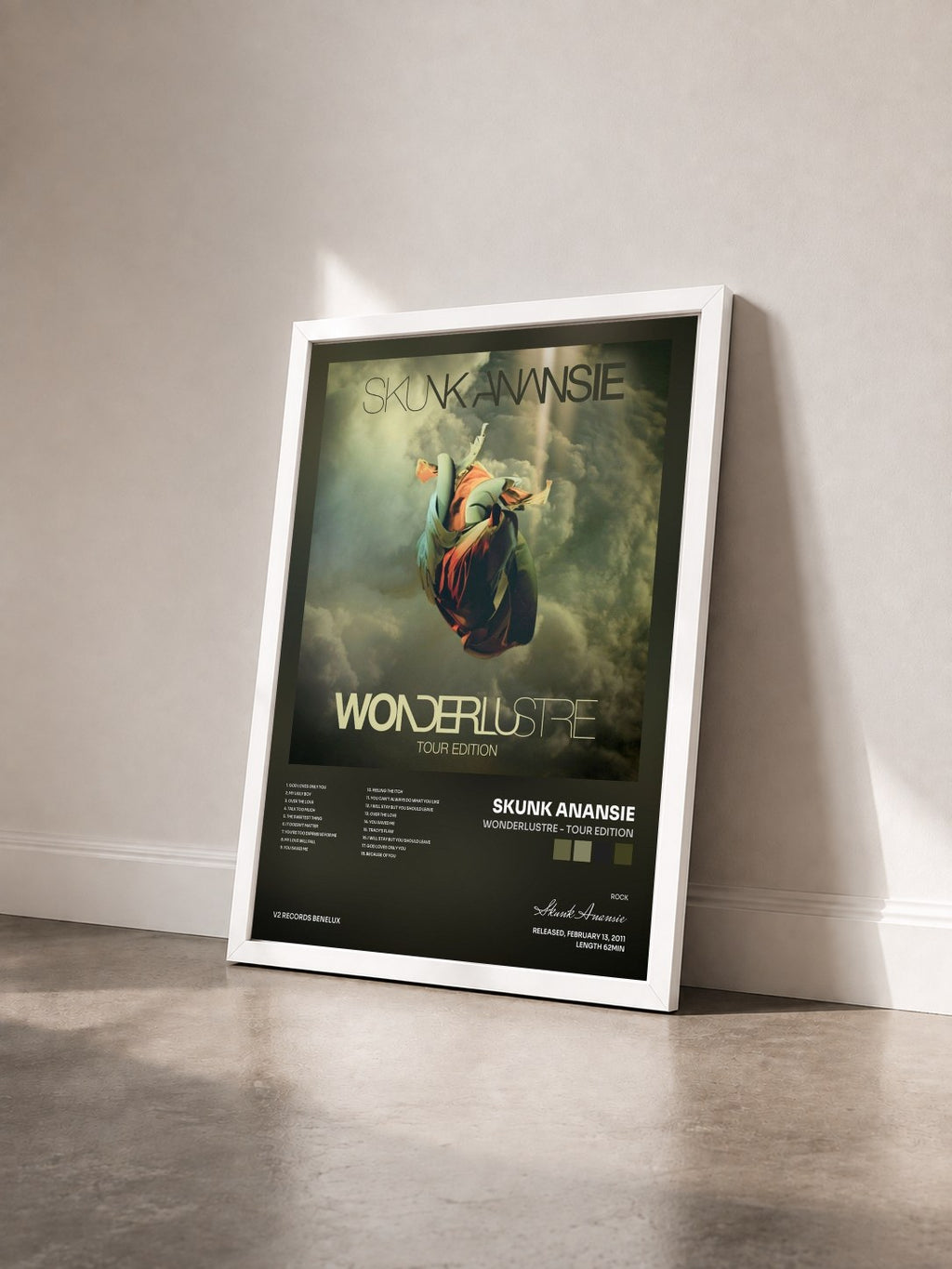#blanc Tableau de l'album Wonderlustre - Tour Edition de Skunk Anansie vu de trois quarts, cadre blanc