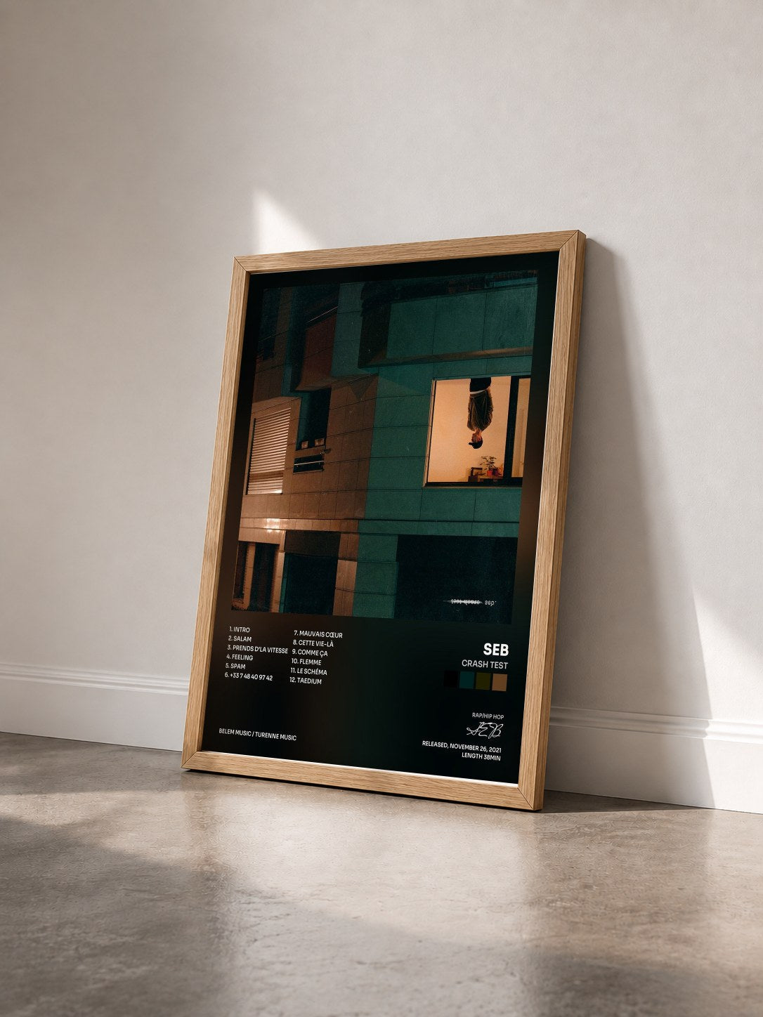 #bois Tableau de l'album Crash Test de SEB vu de trois quarts, cadre en bois brut