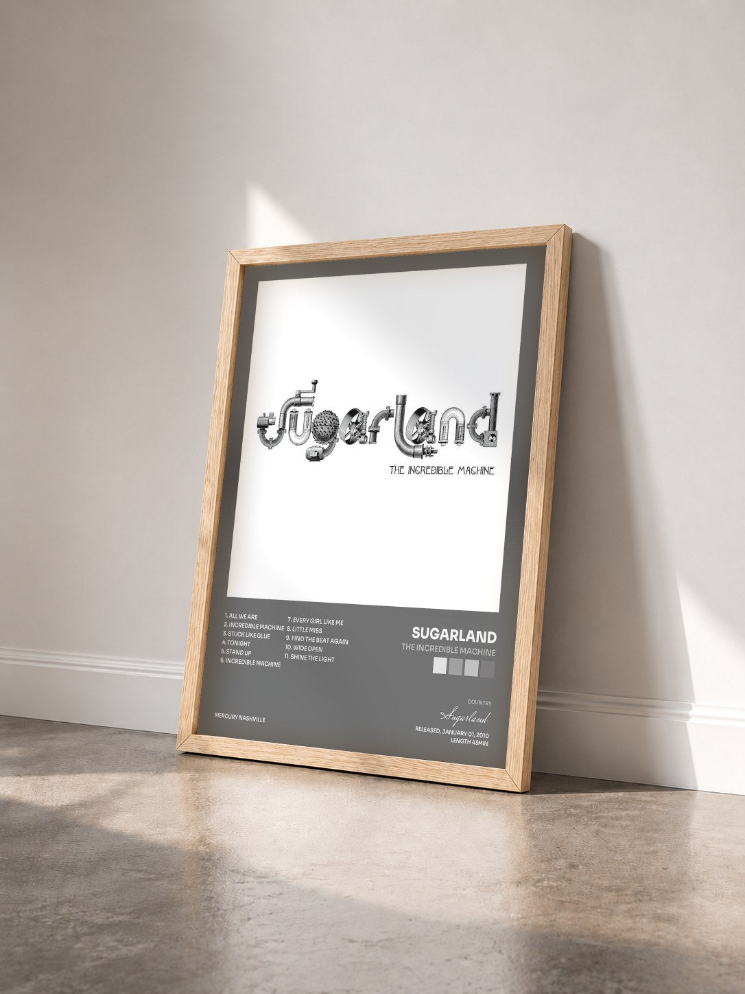 #bois Tableau de l'album The Incredible Machine de Sugarland vu de trois quarts, cadre en bois brut
