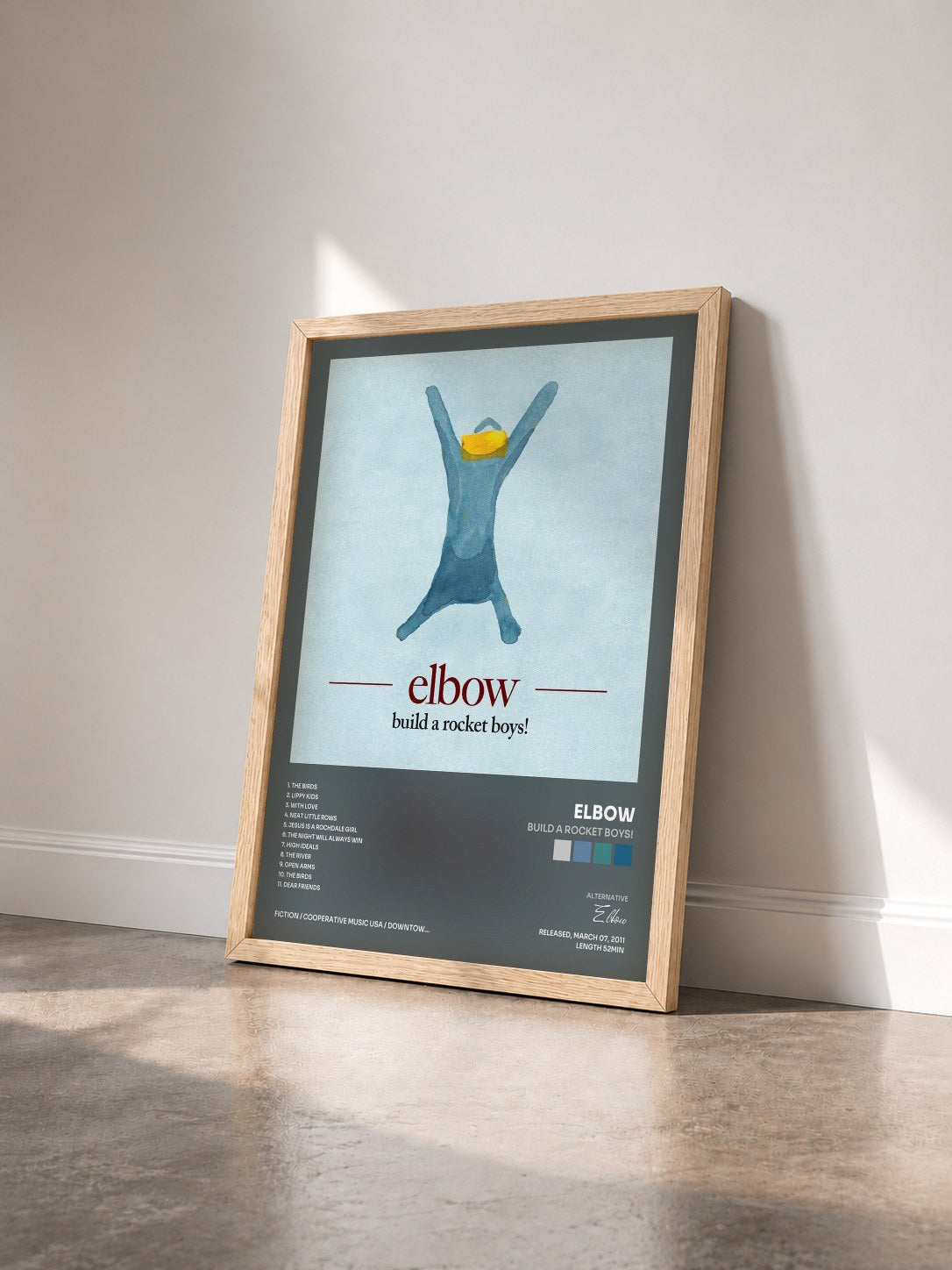 #bois Tableau de l'album build a rocket boys! de Elbow vu de trois quarts, cadre en bois brut