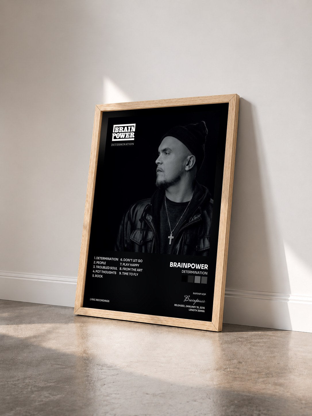 #bois Tableau de l'album Determination de Brainpower vu de trois quarts, cadre en bois brut