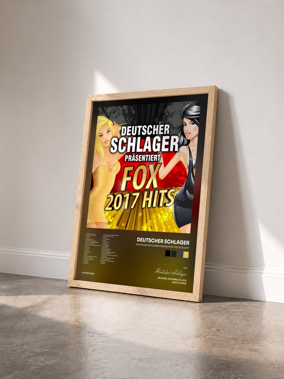 #bois Tableau de l'album Deutscher Schlager präsentiert Fox Hits 2017 de Deutscher Schlager vu de trois quarts, cadre en bois brut
