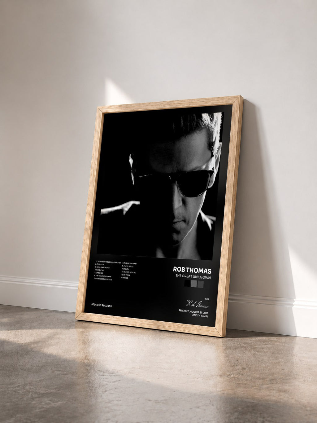#bois Tableau de l'album The Great Unknown de Rob Thomas vu de trois quarts, cadre en bois brut