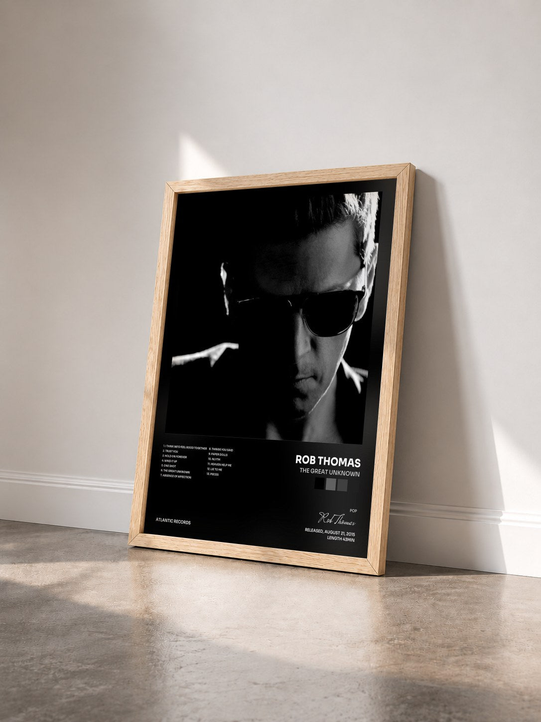 #bois Tableau de l'album The Great Unknown de Rob Thomas vu de trois quarts, cadre en bois brut